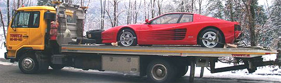 Exotic and sports car haling on flatbed in CT
